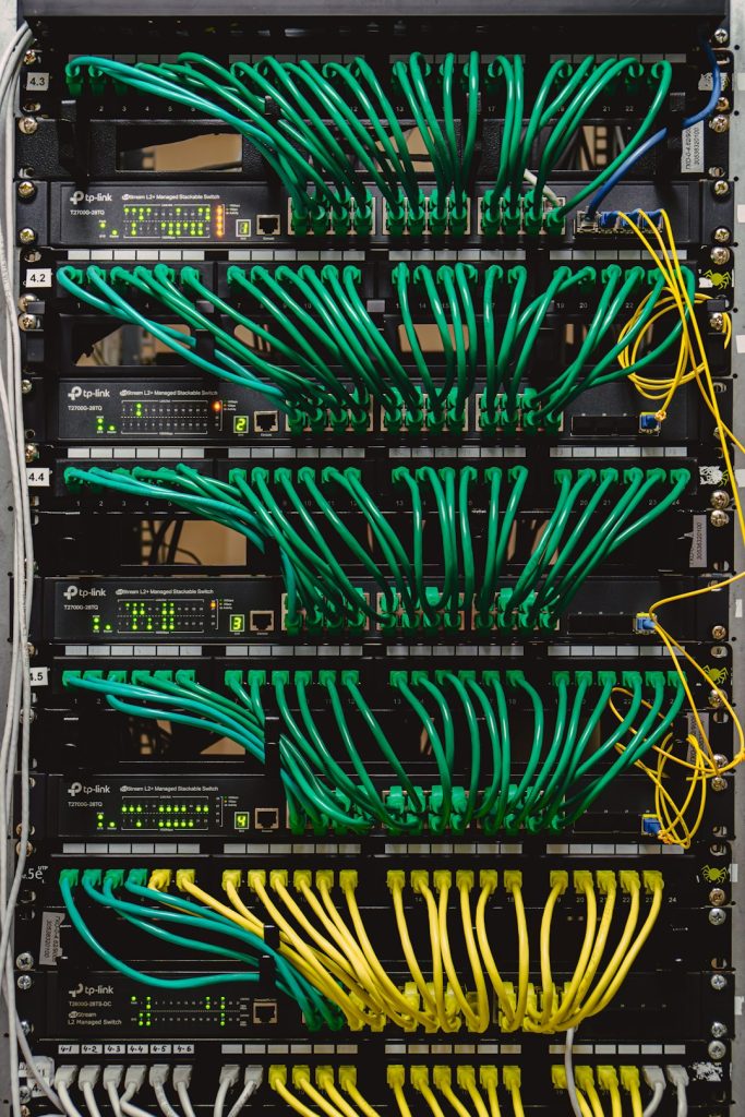 a-rack-with-many-wires-and-wires-attached-to-it-ca9ex6yvrgw